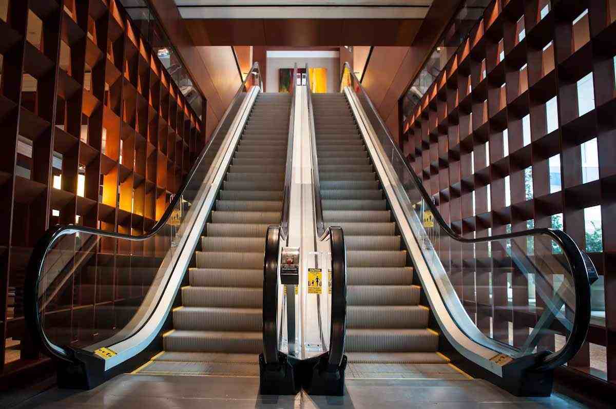 Older Couple Attempts To Go Down The Up Escalator  But Why